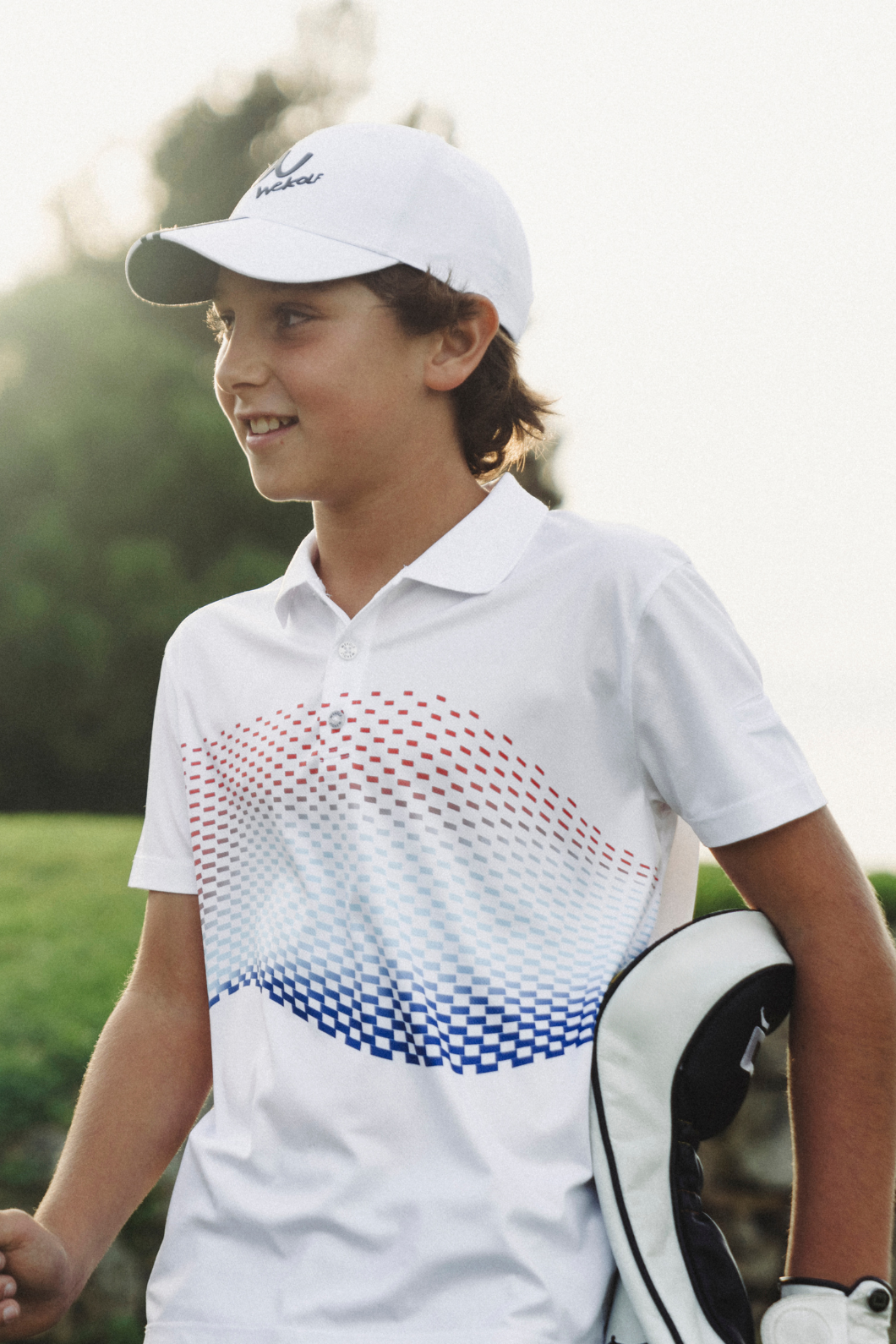 White golf polo shirt with geometric print for boys