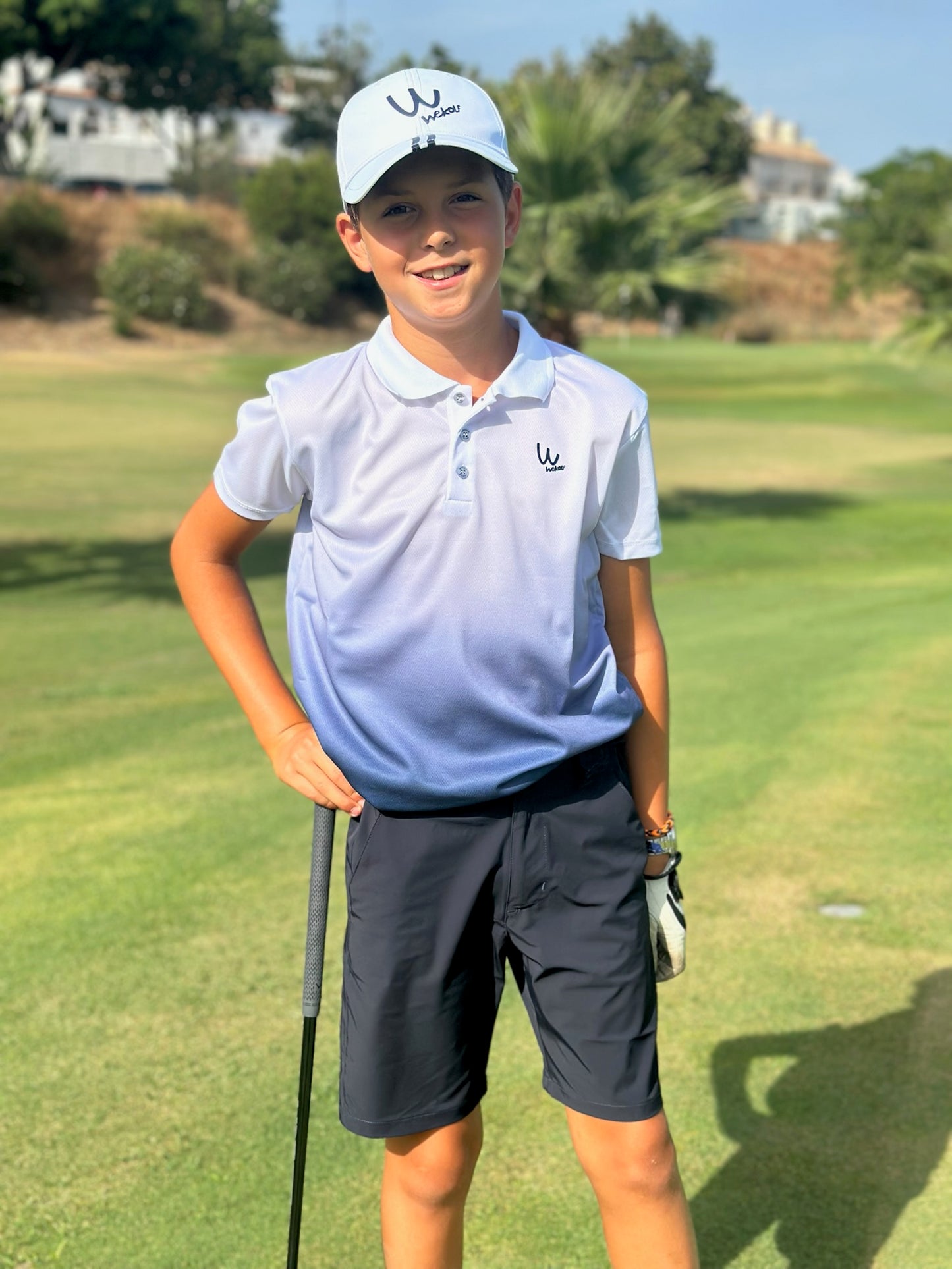 Bermuda golf azul marino para niño