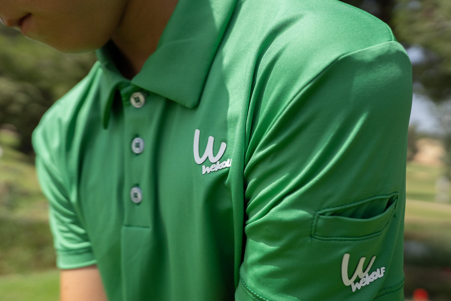 Polo de golf verde para niño