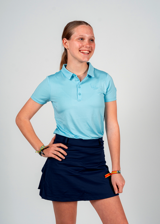 Polo de golf azul claro para niña